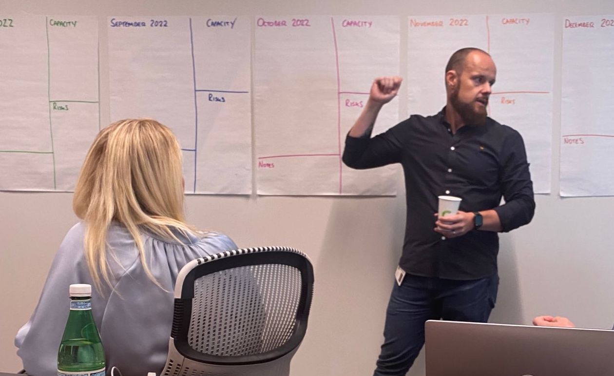 Aaron McKenna coaching a client one-to-one